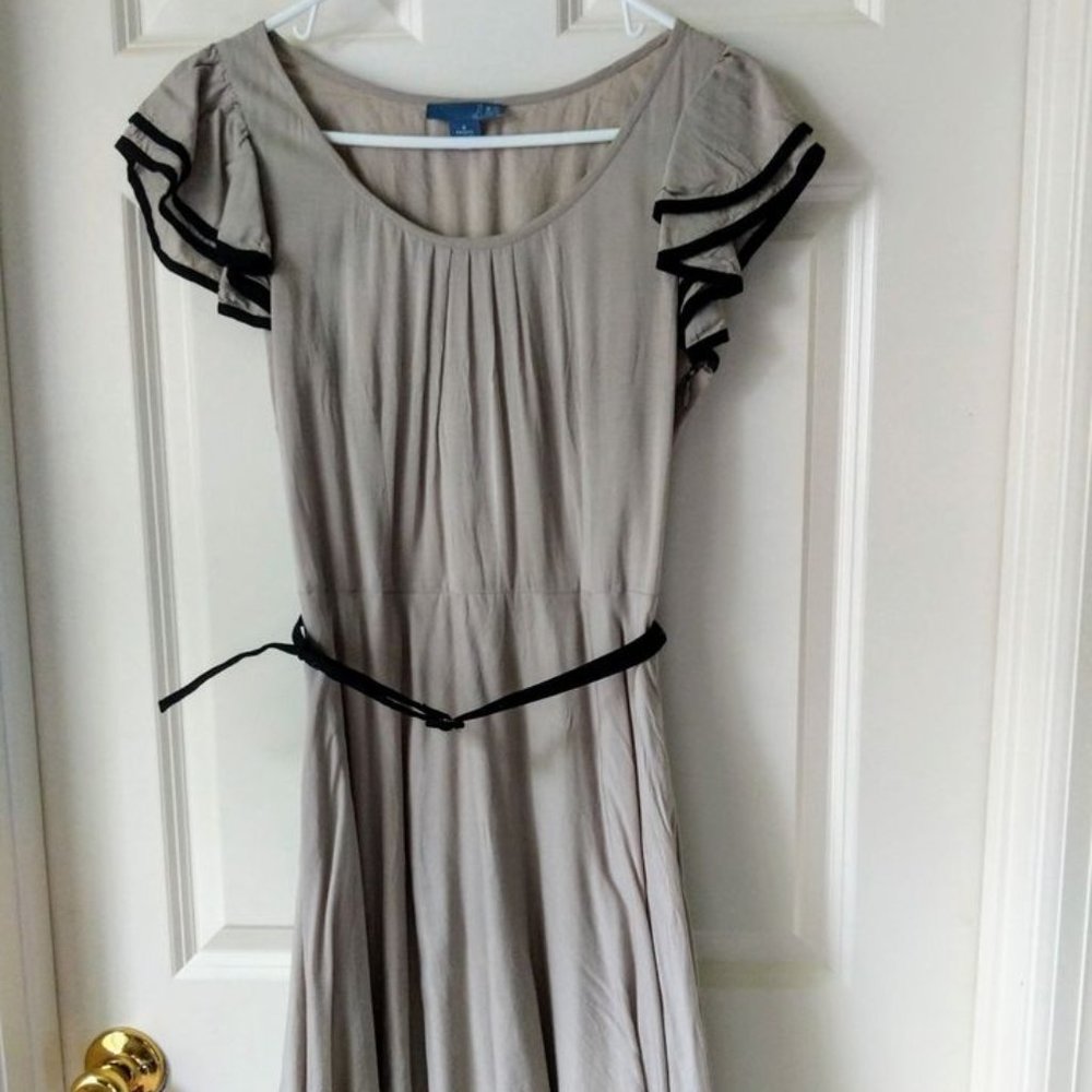 Tan and black ruffled cocktail dress